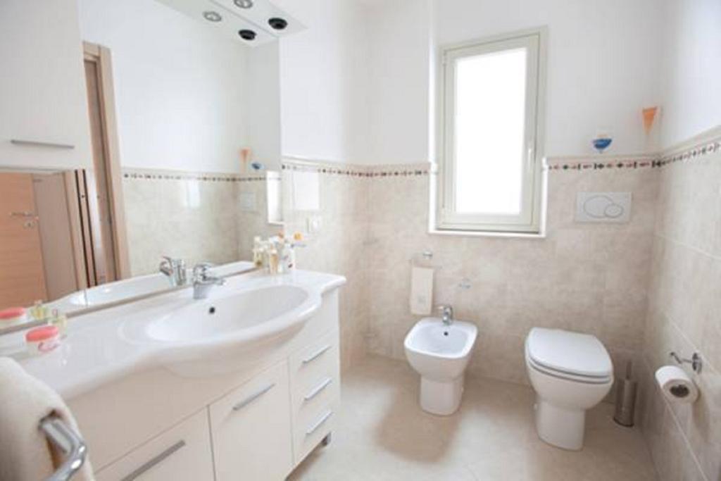 Casa Vacanza Nina ポッツァッロ 部屋 写真
